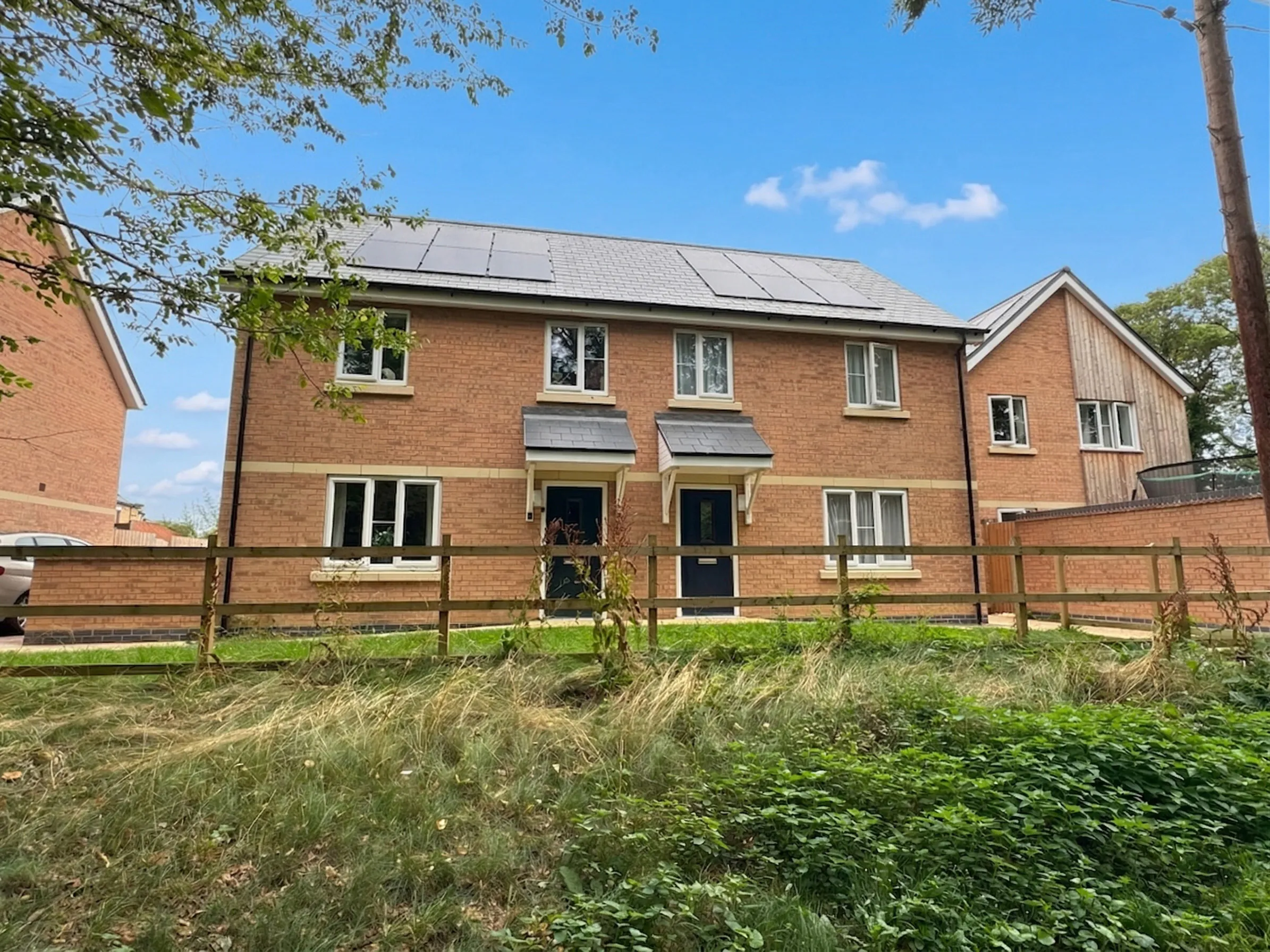 Completed homes at Davids Court, Holdingham with solar panels and landscaped frontage | Lafford Group
