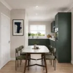 CGI of The Heckingon kitchen-diner with Symphony Harvard hunter green units and Arctic white marble‑effect worktops, dining table and four chairs by a window..