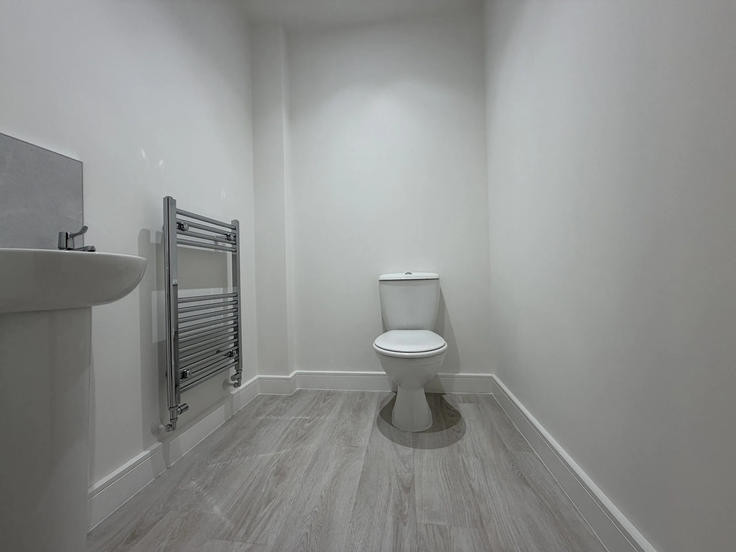 Ground floor WC with chrome towel rail in The Bardney, Plot 45 at Beacon Hollow.