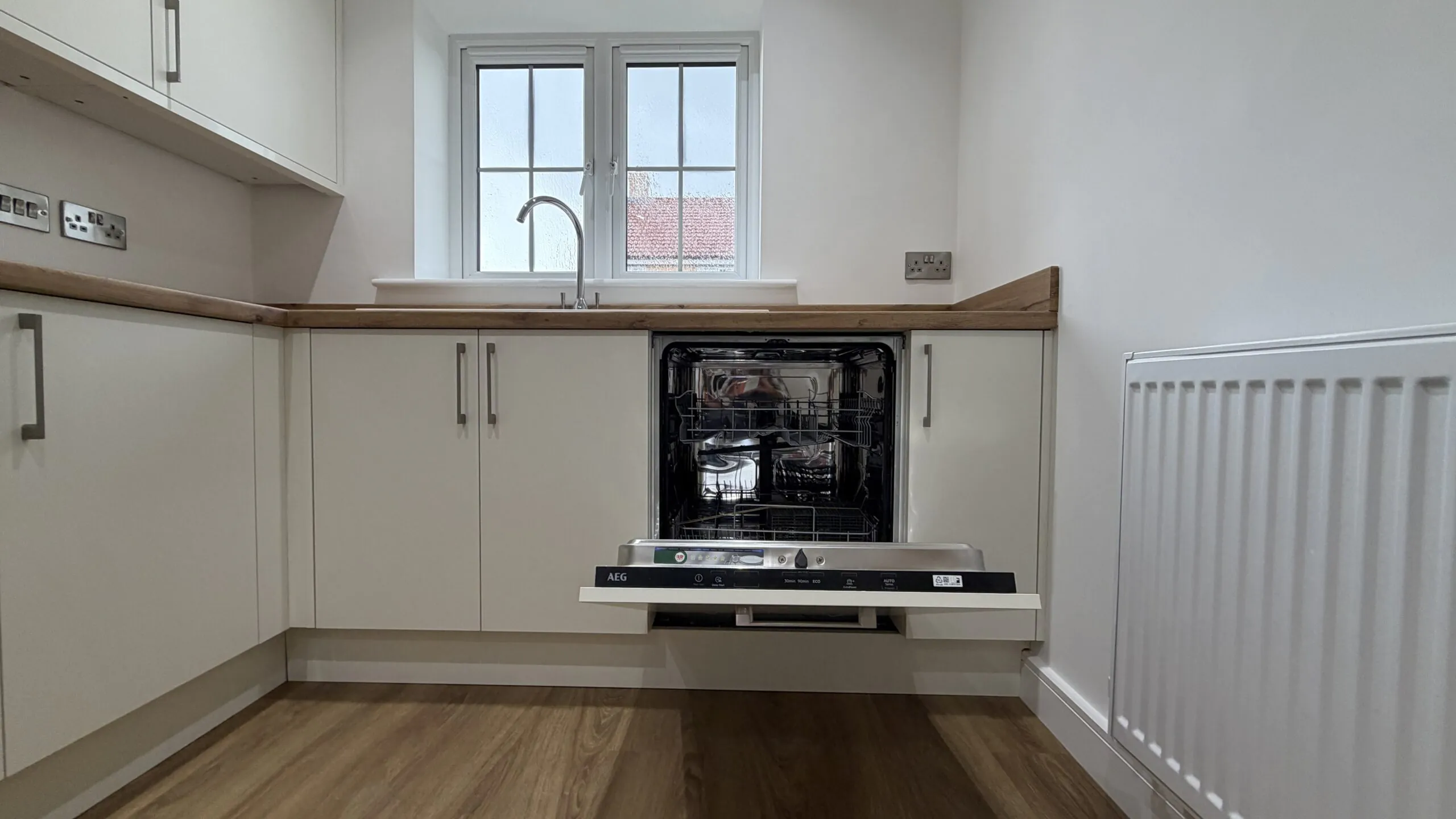 Kitchen showing integrated AEG dishwasher position in The Ruskington, Plot 48 at Beacon Hollow.