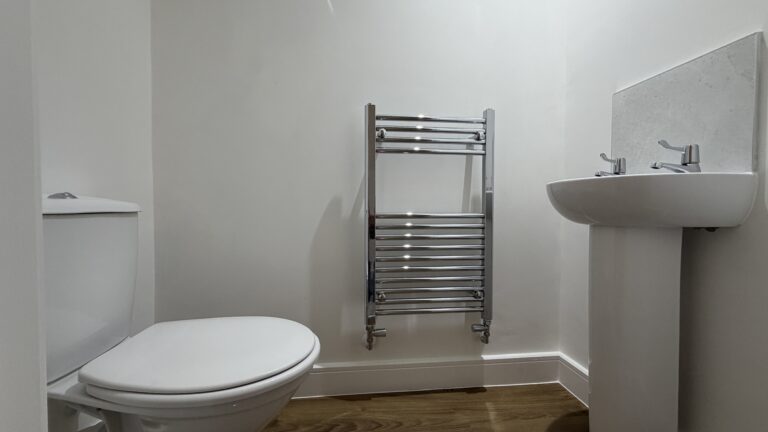 Ground floor WC with heated towel rail in The Ruskington, Plot 48 at Beacon Hollow