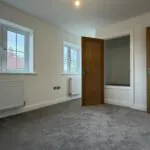 Bedroom 2 with built-in storage cupboard in The Ruskington, Plot 48 at Beacon Hollow