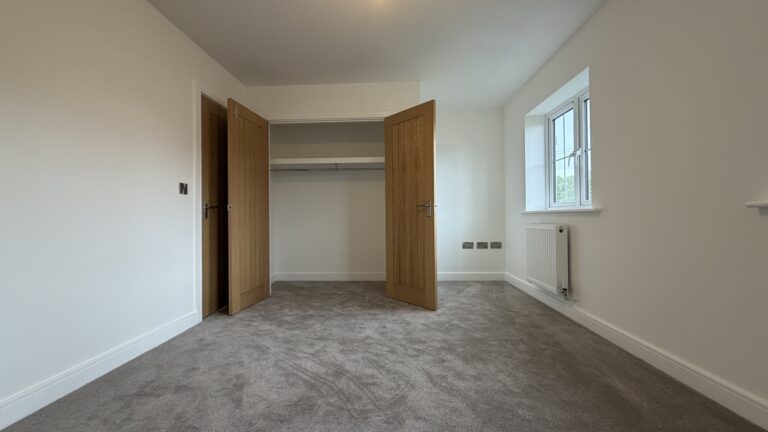 Bedroom 1 with built-in wardrobe in The Ruskington, Plot 48 at Beacon Hollow.