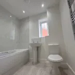 Contemporary family bathroom with bath and shower over at Plot 6 The Long Sutton, Beacon Hollow, Washingborough