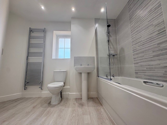 Modern family bathroom with bath and shower over at Plot 2 The Crowland, Beacon Hollow, Washingborough.