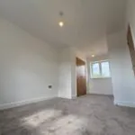 Principal bedroom with adjoining dressing area at Plot 2 The Crowland, Beacon Hollow, Washingborough.