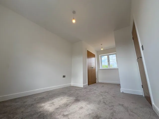 Principal bedroom with adjoining dressing area at Plot 2 The Crowland, Beacon Hollow, Washingborough.