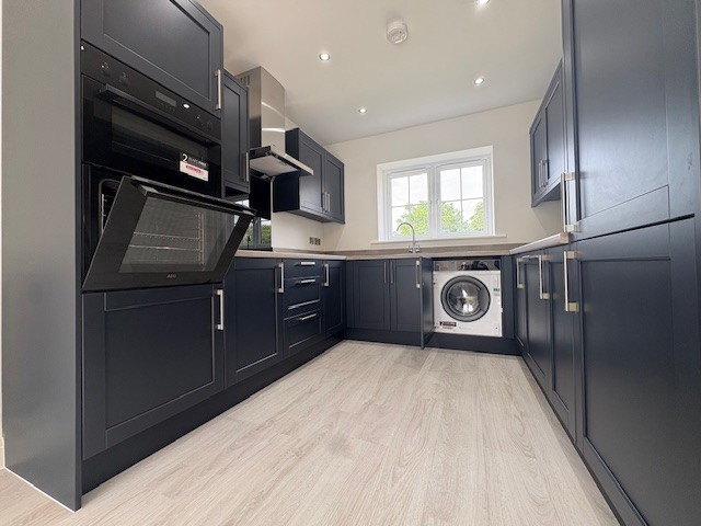 Modern kitchen with integrated AEG appliances at Plot 2 The Crowland, Beacon Hollow, Washingborough
