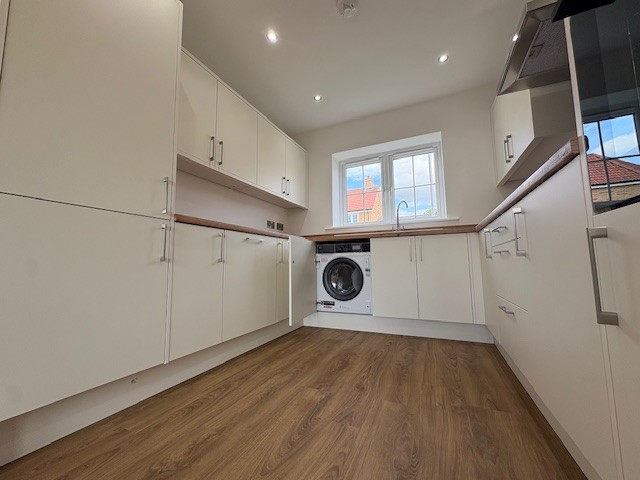 Modern kitchen with integrated AEG appliances at Plot 3 The Crowland, Beacon Hollow, Washingborough
