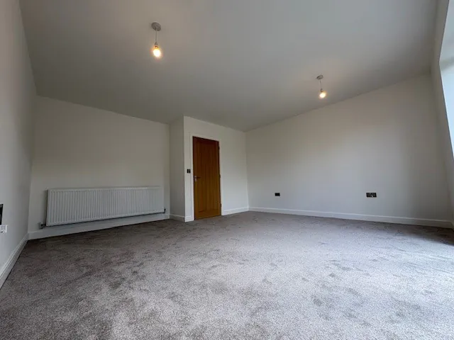 Open-plan living and dining room with patio doors at Plot 6 The Long Sutton, Beacon Hollow, Washingborough