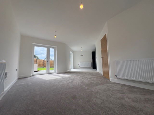 Spacious living room leading to the dining and kitchen areas at Plot 2 The Crowland, Beacon Hollow, Washingborough