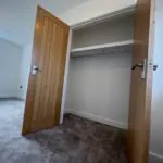 Built-in wardrobe area within the principal bedroom at Plot 3 The Crowland, Beacon Hollow, Washingborough.