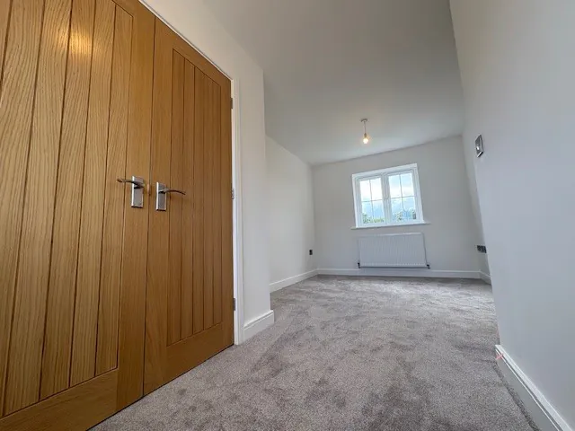 Principal bedroom with adjoining dressing area at Plot 2 The Crowland, Beacon Hollow, Washingborough