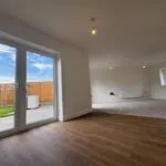 Dining area opening into the living space at Plot 3 The Crowland, Beacon Hollow, Washingborough.